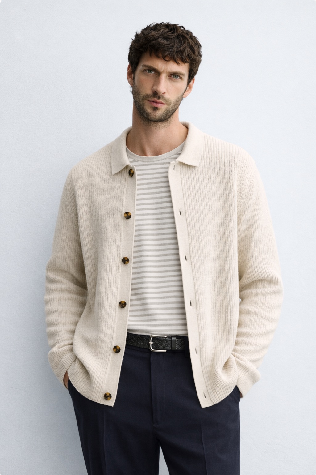Man wearing knit cardigan